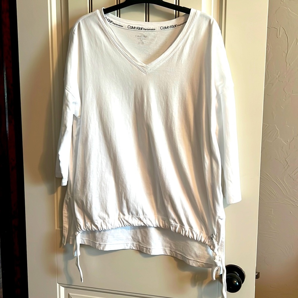 Calvin Klein Top in Excellent Condition.   Worn Twice and Still Very White.